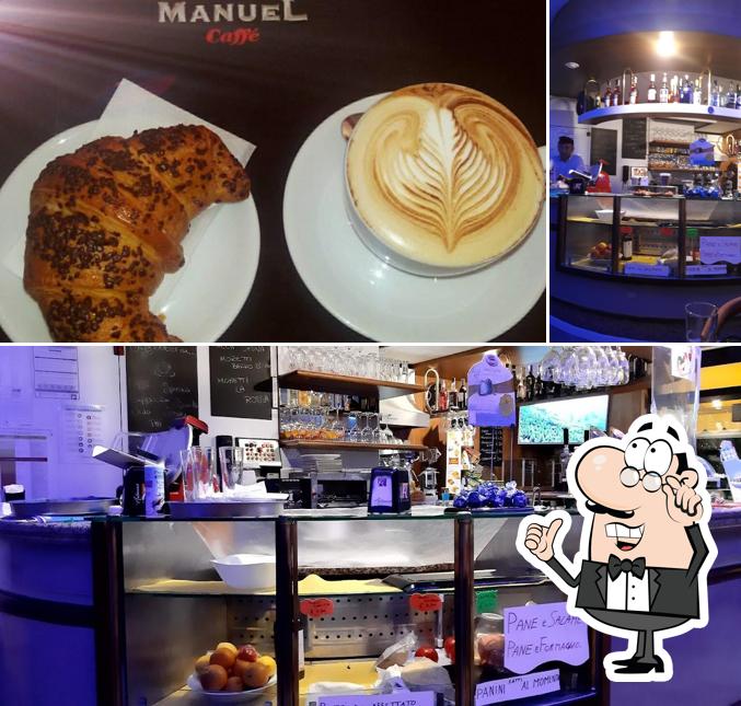 Questa è la immagine che presenta la interni e cibo di New Jolly Bar