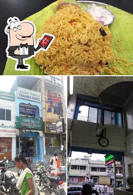 The photo of exterior and food at Thahira Hotel