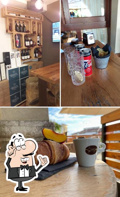 Questa è la immagine che presenta la interni e cibo di 4+1 Amici Al Bar