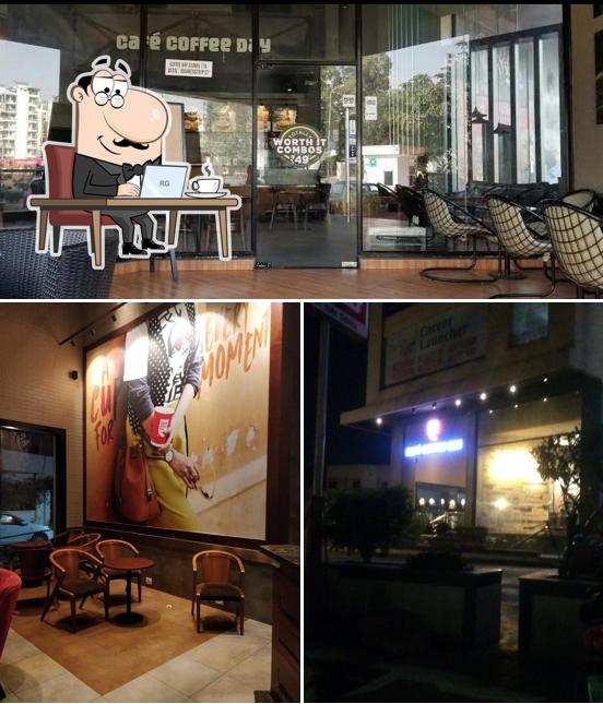 Take a seat at one of the tables at Café Coffee Day