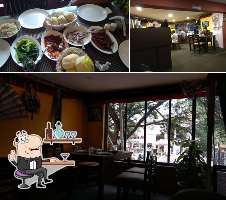 Take a seat at one of the tables at Tenzin Kitchen(Tibetan Restaurant)