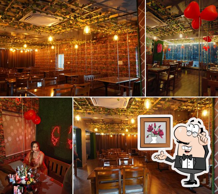 Take a seat at one of the tables at Uyyala Jampala Multi Cuisine Family Restaurant