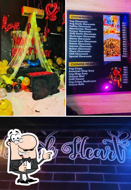 Look at this photo of Black heart cafe