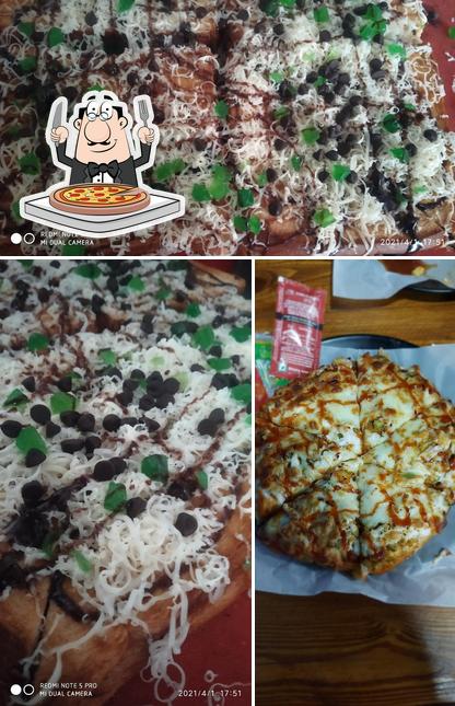 Try out pizza at Cafe Icy Spicy