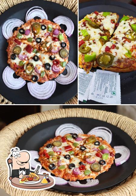 Try out pizza at Apunka Addaa