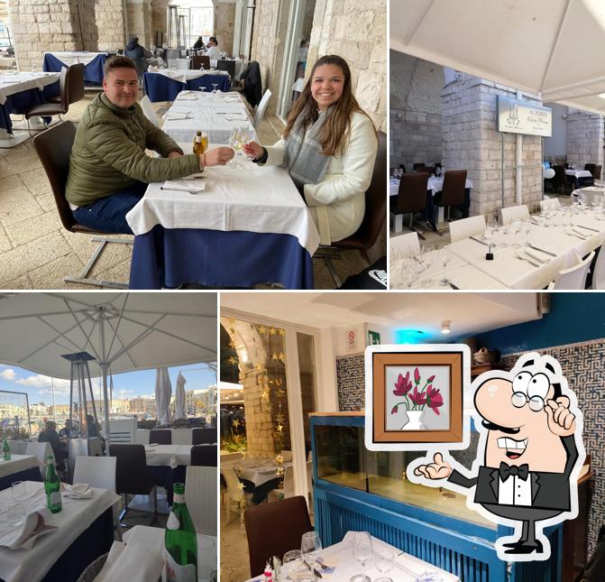 Dai un'occhiata agli interni di Al Porto Osteria Pizzeria