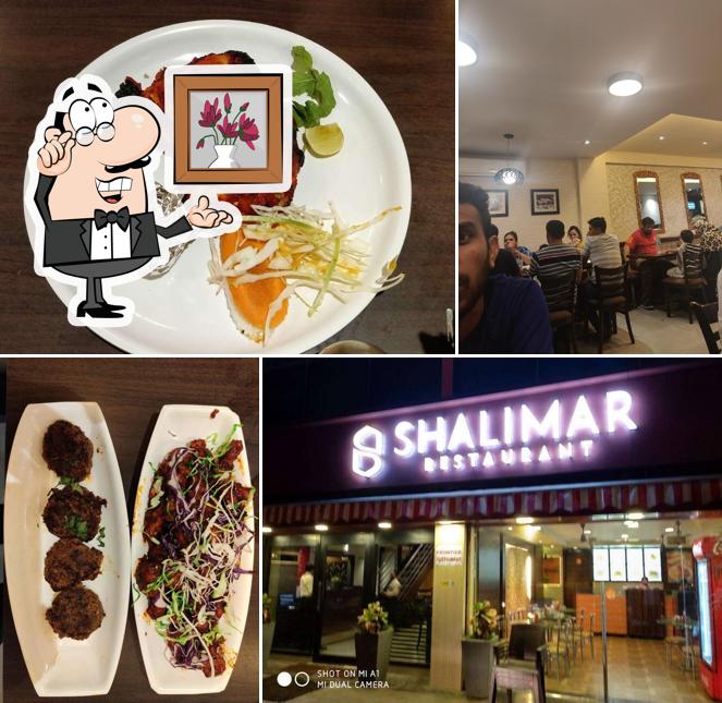 Take a seat at one of the tables at Shalimar Restaurant