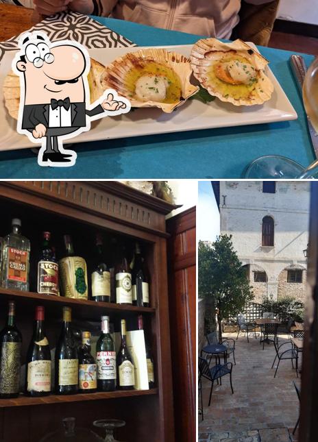 Guarda la foto che mostra la interni e cibo di A L'ombra de la Tore