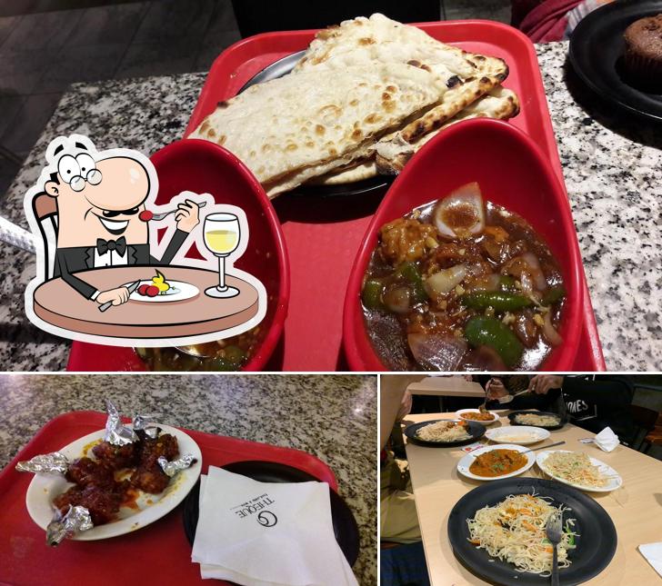 This is the picture depicting food and dining table at Theque