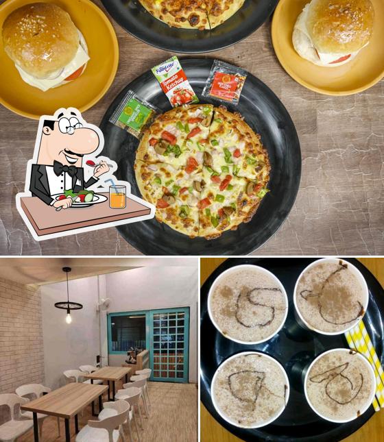 The photo of food and interior at Cafe Pizza Bites