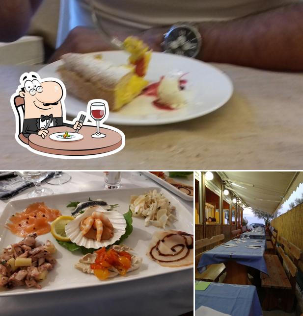 La immagine della cibo e tavolo da pranzo di Ristorante