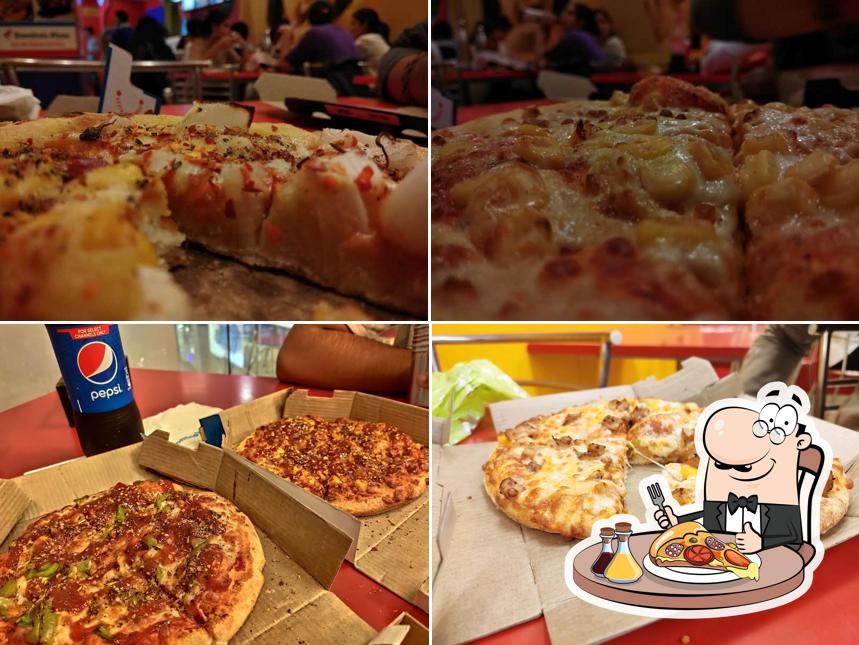 Get pizza at Domino's Pizza Jawahar Nagar, Ujjain