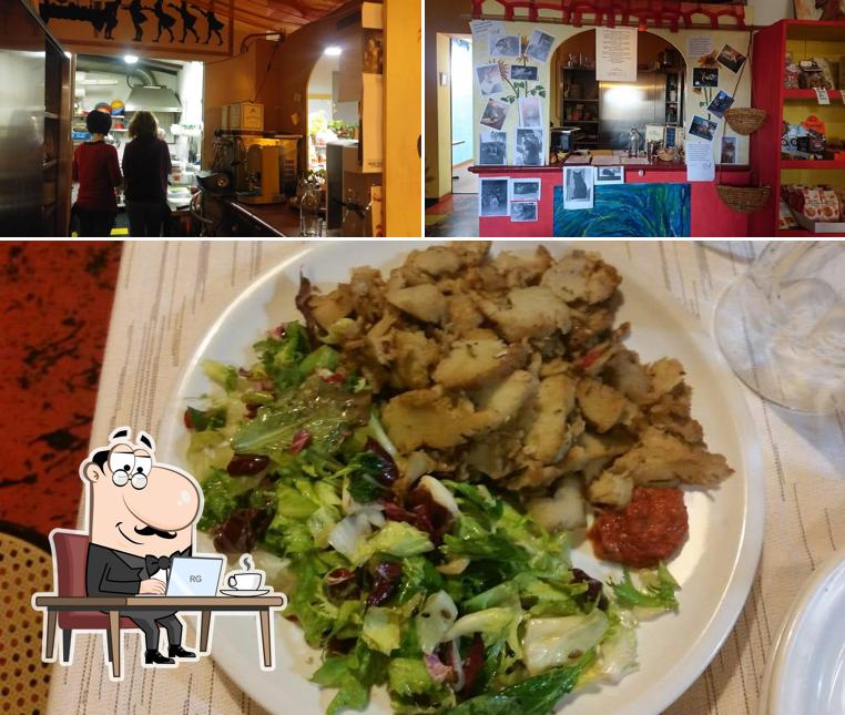 Questa è la immagine che presenta la interni e cibo di Osteria di Arzach