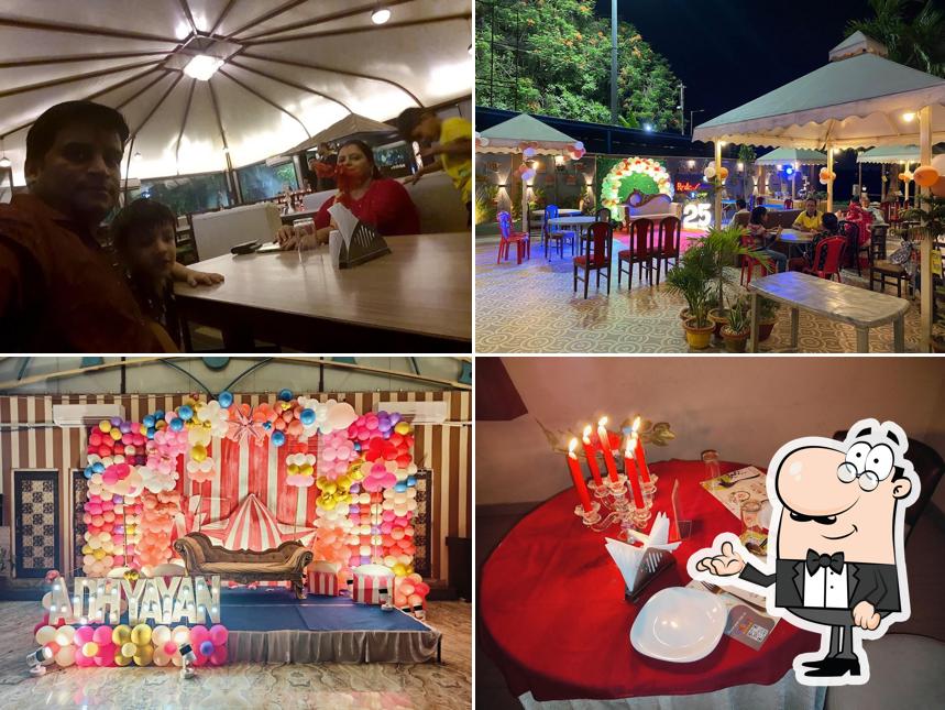 Take a seat at one of the tables at Reda Restaurant & Banquet Banquet Hall in Uttarpara Family Restaurant in Uttarpara