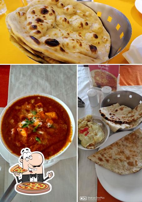 Get pizza at New Citi Dhaba