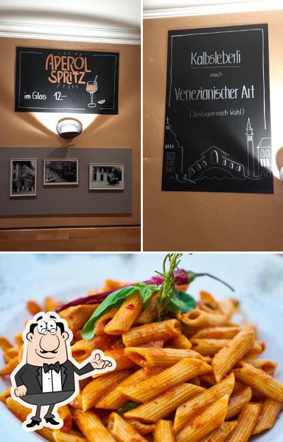 La immagine di interni e cibo da Gasthof zu Metzgern