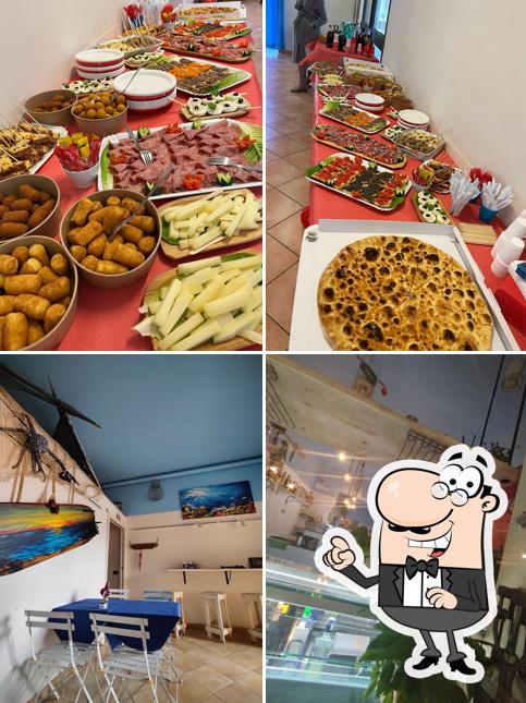 La foto della interni e cibo di Da Tommy's Bar Pizzeria