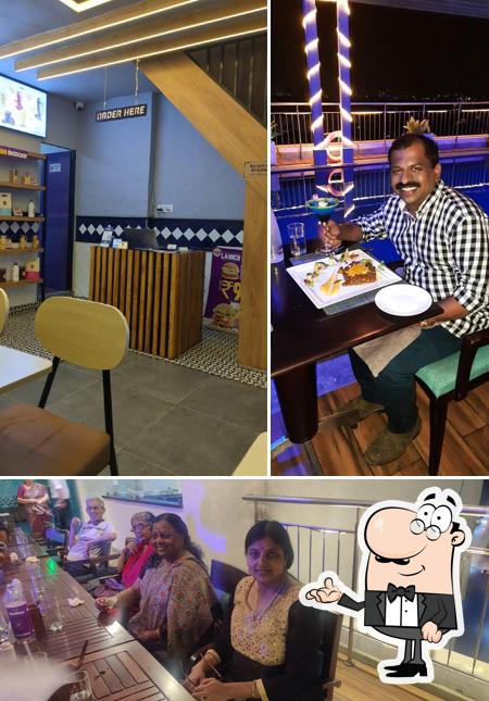 Take a seat at one of the tables at Sky Lounge 10