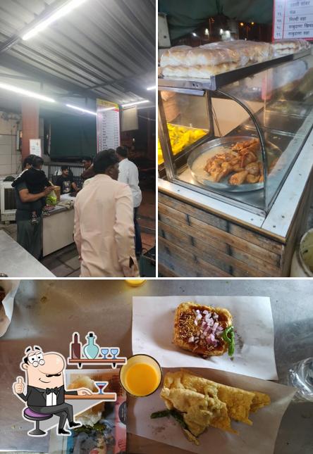 The photo of interior and food at Om Chat Bhandar