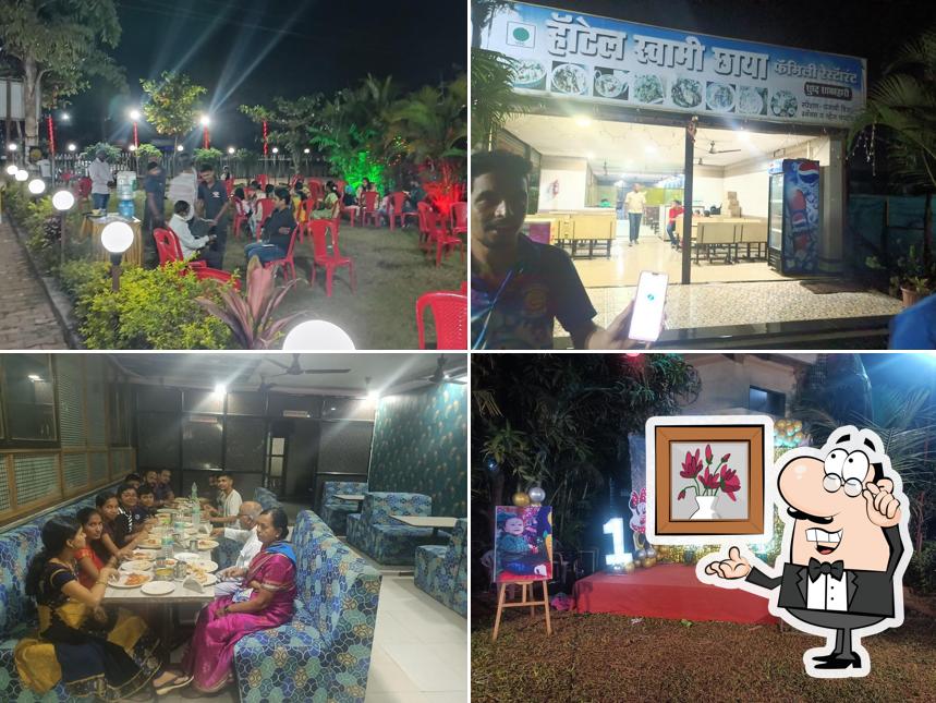 Take a seat at one of the tables at Hotel Swami Chaya ( veg dhaba )