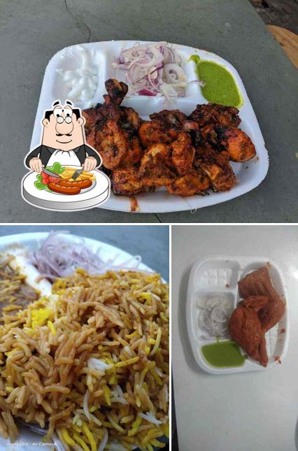 Chicken wings and fried rice at Delhi Spice Roll Hut