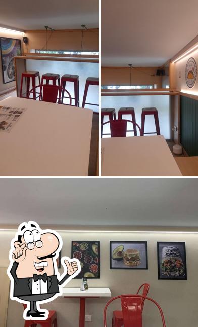 Take a seat at one of the tables at New York Burrito Company