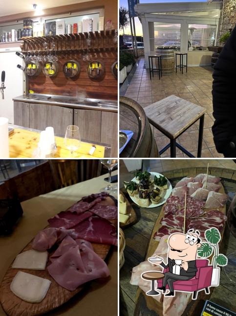 Dai un'occhiata agli interni di Enoteca il Tino