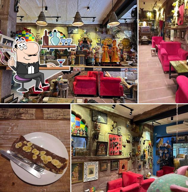 Take a seat at one of the tables at Sam's Art Cafe