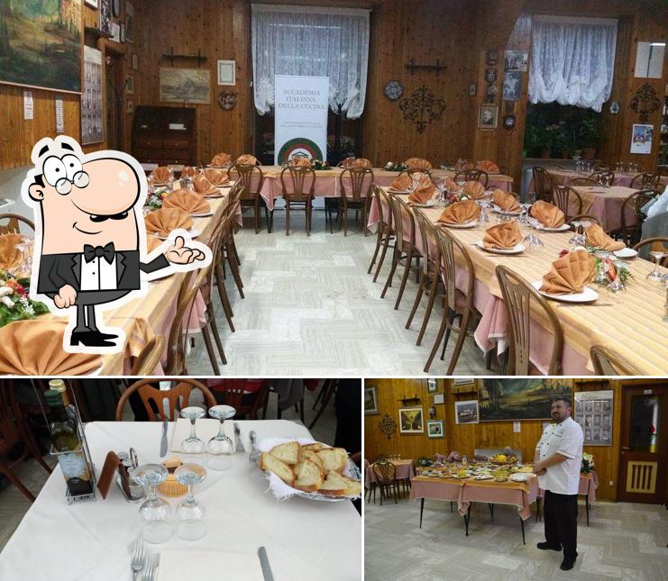 La immagine della interni e tavolo da pranzo di Ristorante da Mario