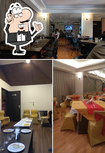 Take a seat at one of the tables at ABIS CHICKEN DELIGHT