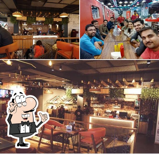 Take a seat at one of the tables at Coffee King