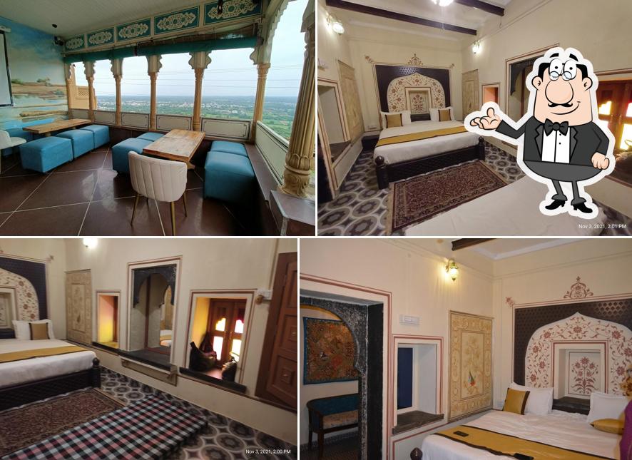 Take a seat at one of the tables at Rang Mahal