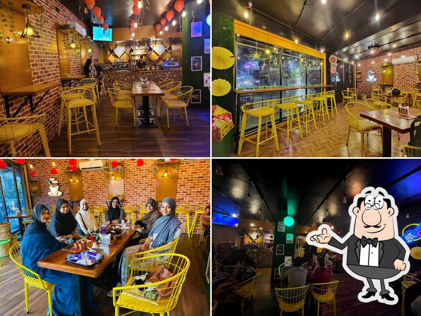 Take a seat at one of the tables at Chai Sutta Bar