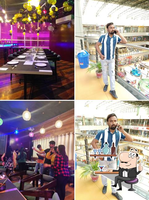 Take a seat at one of the tables at California Bistro by County Park & Suites