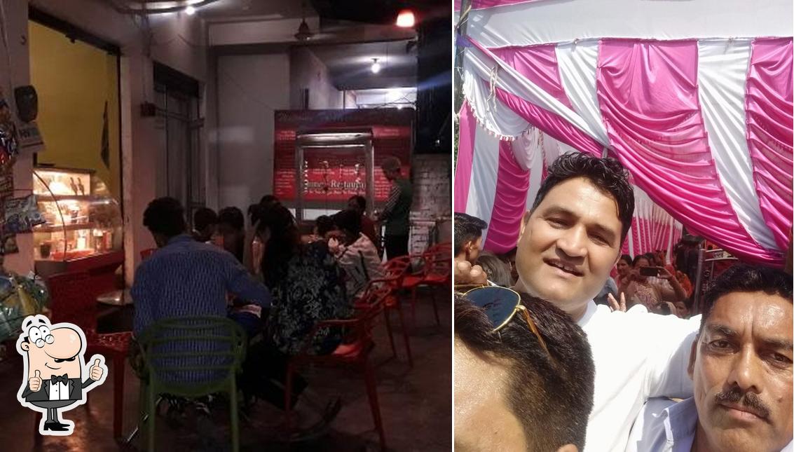 Look at this photo of Karan De Cafe