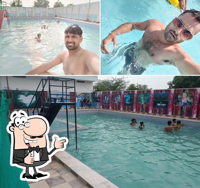 See this photo of MD water park and cafe point