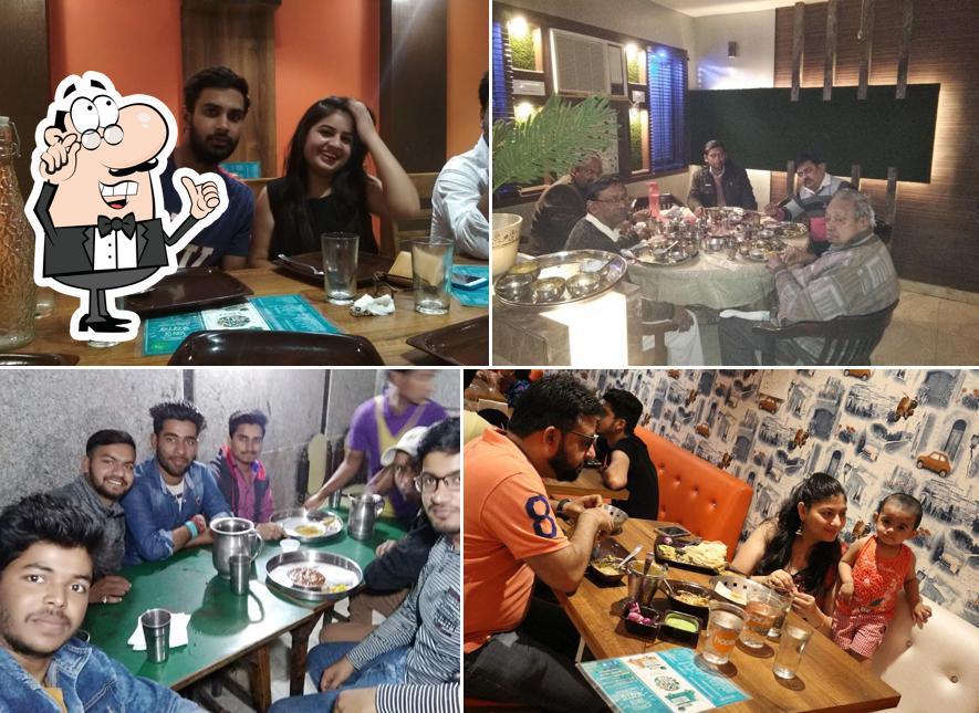 Take a seat at one of the tables at SON OF SWAAD - Best Family Restaurant In Meerut/ Best Malai Chaap in Meerut