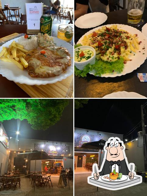 Dê uma olhada a imagem ilustrando comida e interior a Seu Germano Boteco e Choperia