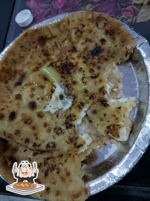 Try out pizza at Moolchand Parantha Sanjay Chur Chur Naan