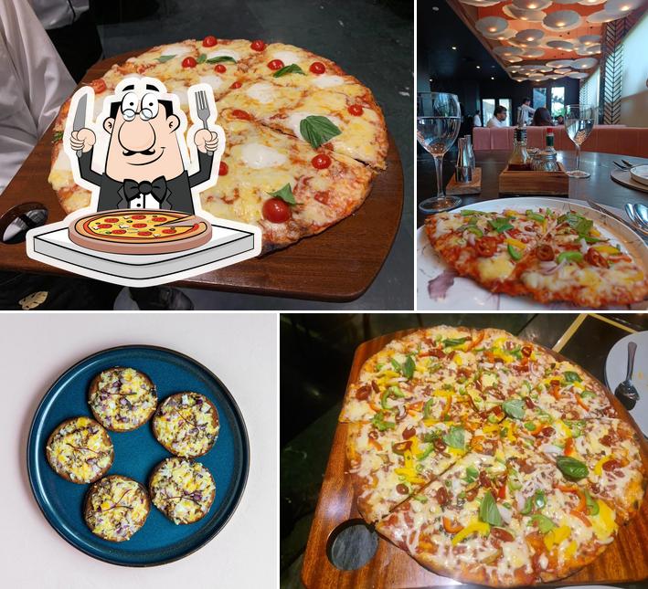 Try out pizza at Nosh Ahmedabad
