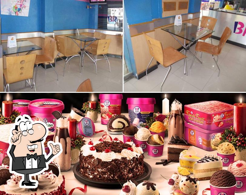 Take a look at the image showing interior and cake at Baskin-Robbins