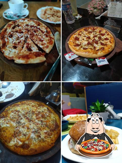 Try out pizza at Mirage Cafe
