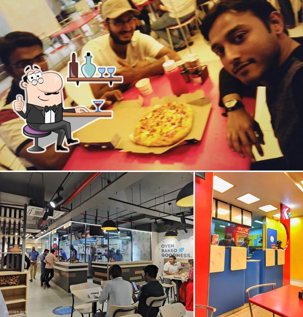 The interior of Domino's Pizza Shradha Mall Tirandaz Talkies, Gulbarga