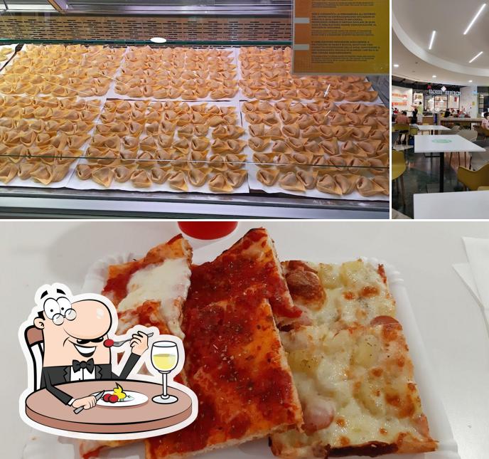 Tra le diverse cose da Rom'antica Ferrara si possono trovare la cibo e interni