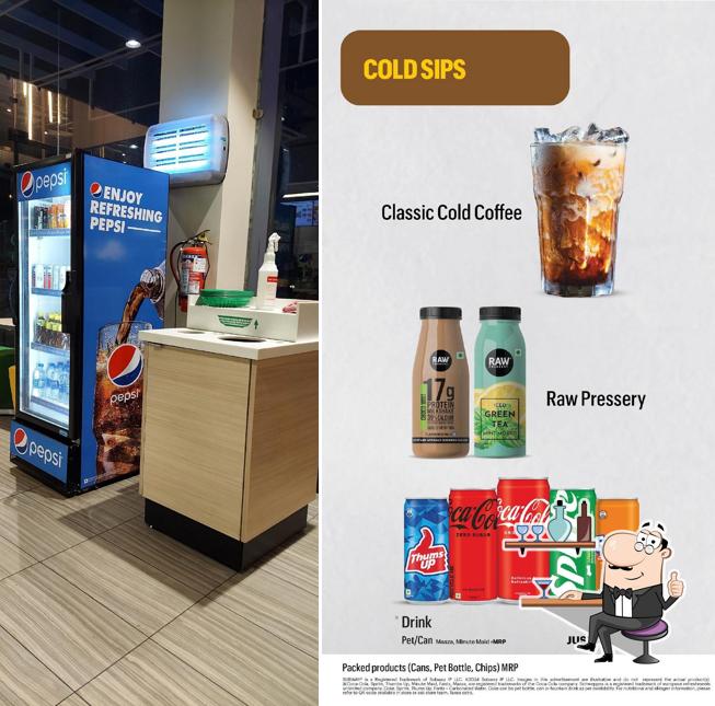 Take a seat at one of the tables at Subway Hoshiarpur Road