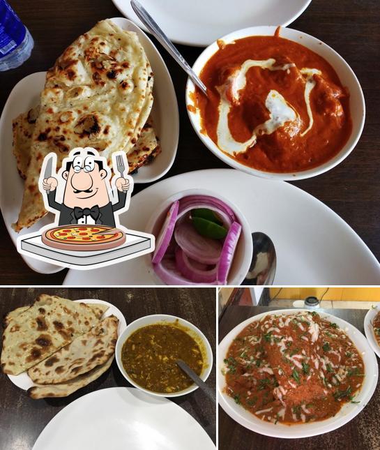 Get pizza at Cosy Kitchen