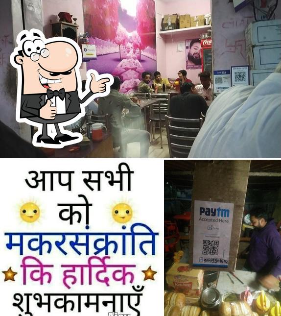 Look at the photo of Ashu Fast Food Point