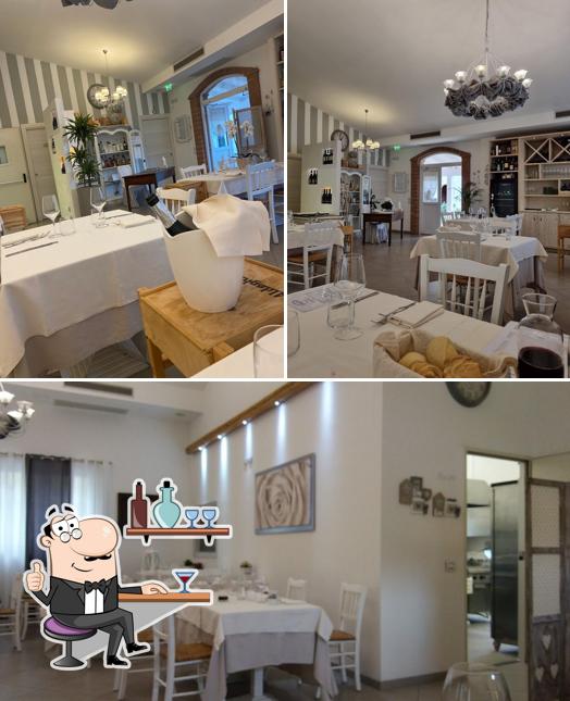 Dai un'occhiata agli interni di Ristorante Corte Peretti - Cucina tipica, bolliti e carne alla brace