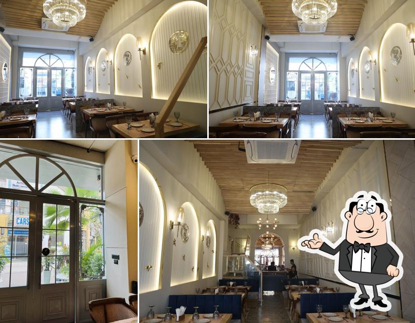 Take a seat at one of the tables at Houz of Commons