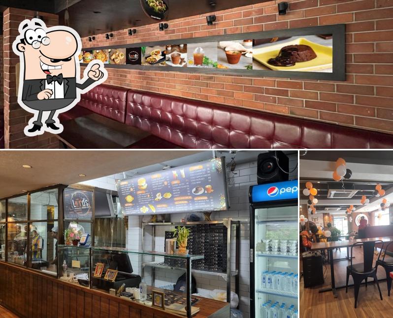 Take a seat at one of the tables at Lord's Maninagar